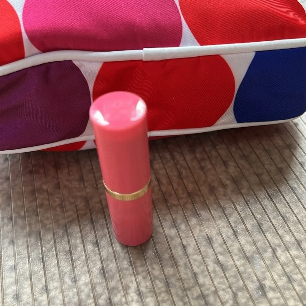 Estée Lauder candy shimmer long lasting lipstick.